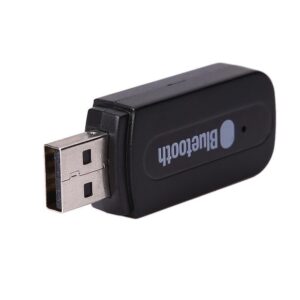 Black Mini Usb Wireless Receiver Plugged Into A Laptop Port Sending Audio To Desk Speakers